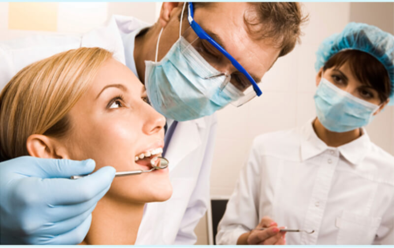 Picture of a female patient with her Costa Rica dentist.