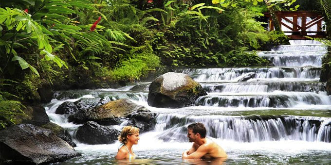 Picture of a happy couple enjoying Costa Rica’s Hot Springs.