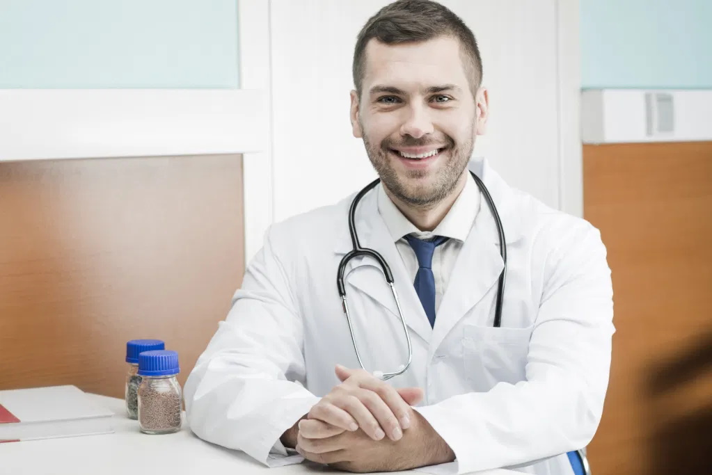 Picture of a smiling medical doctor.